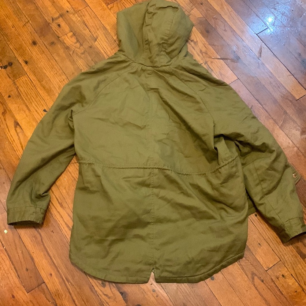 dark green Trench coat, size medium in lady’s.